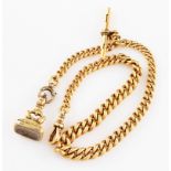 A Victorian 18ct yellow gold curb link watch chain, featuring a T-bar and a 14ct gold yellow gold