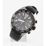 *A Tag Heuer Formula 1 gents quartz see wrist watch, the black dial having baton hourly markers with