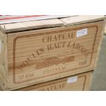 Chateau Moulin Haut-Laroque 1998. 12 bottles. Fill level into neck good label & capsule. Fronsac,