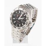 *A Tag Heuer gents stainless steel Formula 1 quartz wrist watch, the black dial having baton