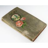 A post card album contains assorted postcards including topographical, seasonal, song cards,