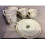 A selection of China plates and cups with various crests by various brands