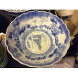 An early 20th Century Oriental blue and white dish with six character mark to base.