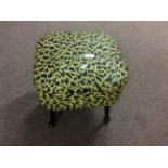 A 1960's retro animal print lift up top sewing box by Sherbourne, on wooden legs. (No. 890810)