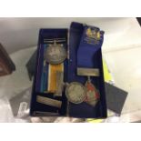 A set of Birmingham safety first council medals and badges and WW1 medal pair.