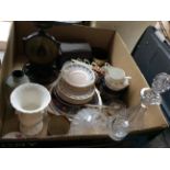 A box of assorted items including a bone China Colclough tea set, two cut glass decanters and a