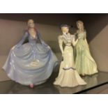 Three China Coalport figurines modelled and hand decorated by John Bromley.