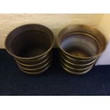 Two brass pots.