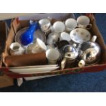 Two boxes of assorted items including a Duchess China tea set, metal and ceramic tea pots and blue