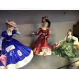 Three Royal Doulton figurines; 'Patricia,' 'Mary,' 'Elyse.'