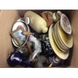 A box of various ceramic plates, glass vases, an embroidered picture and assorted glasses.