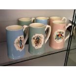 A group of six pastel coloured ceramic jugs by T.G Green & Co, decorated with various Dickens