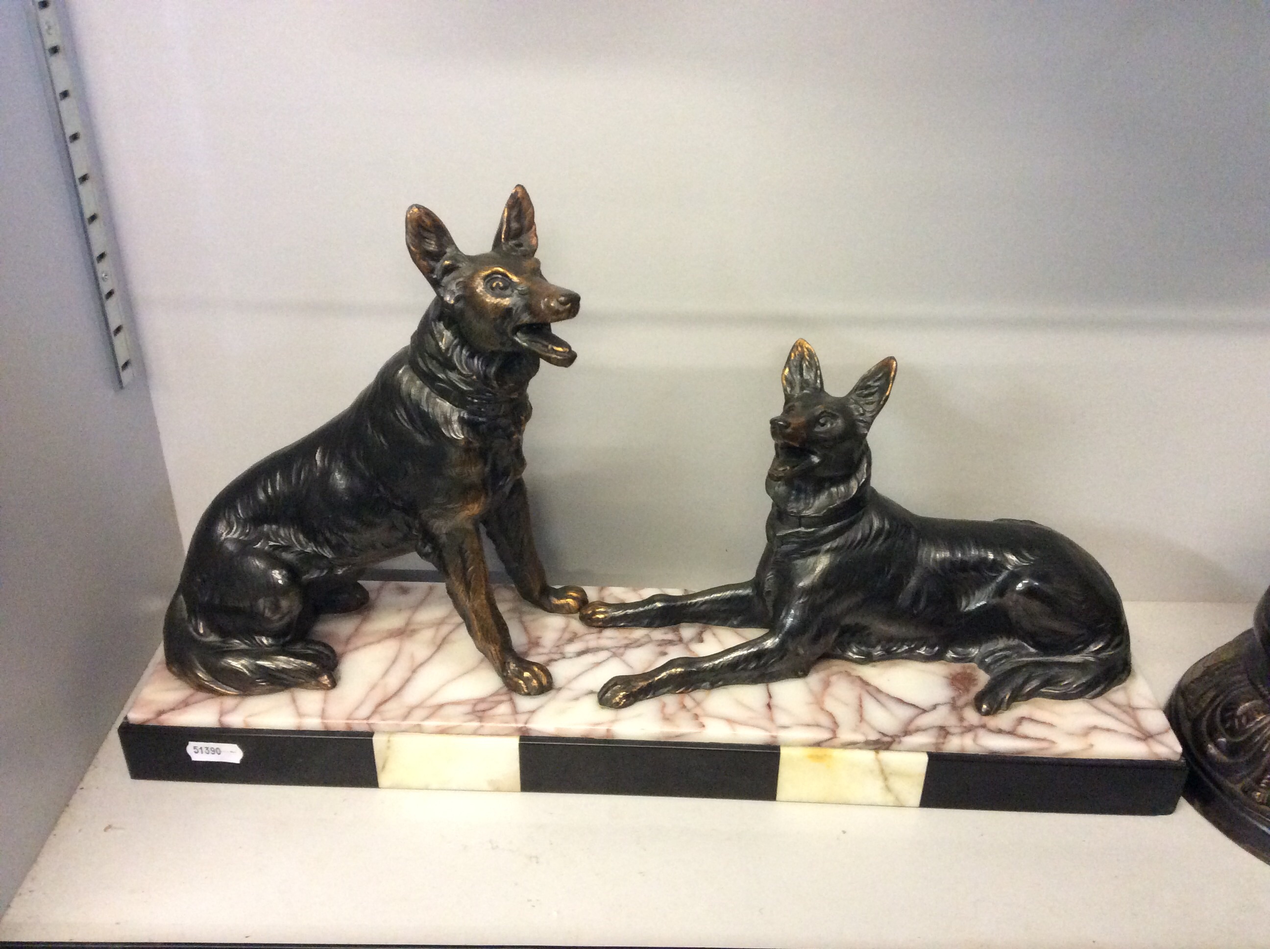 Two cast metal Alsatian dogs with Art Deco style marble base.