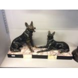 Two cast metal Alsatian dogs with Art Deco style marble base.