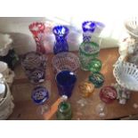 A selection of coloured glassware.