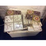 A collection of early 20th Century floral pottery tiles.