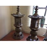 A pair of brass oriental house style lamps.