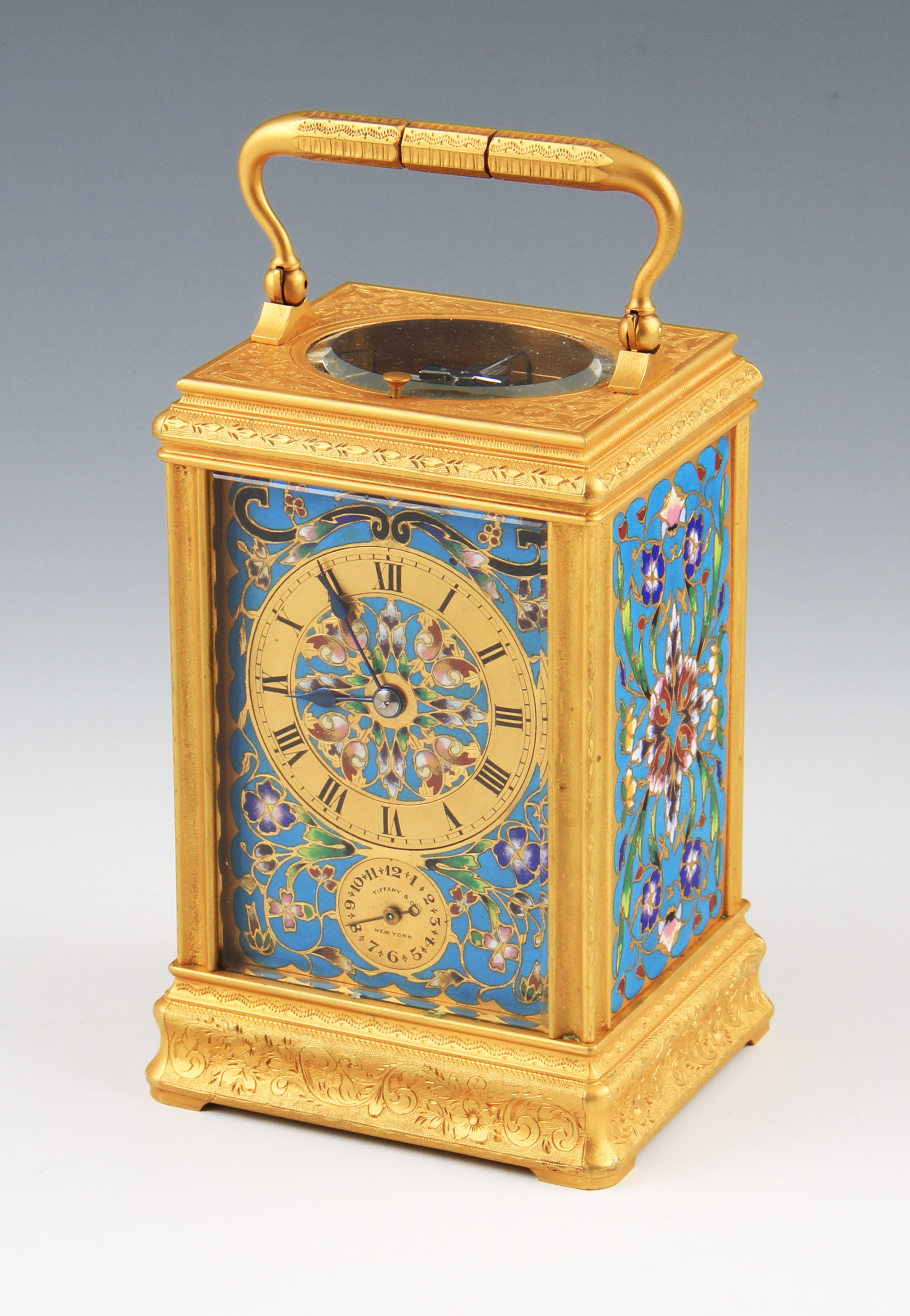 A 20th Century champleve and gilt metal repeater alarm carriage clock marked to dial Tiffany & Co,