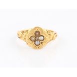 A Victorian 18ct yellow gold seed pearl ring, set with four seed pearls within a quatrefoil