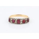 A ruby and white sapphire half hoop eternity ring, set with five graduated rectangular cut rubies,