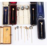 A collection of fifteen various stick pins, to include Edwardian examples and Masonic examples, some