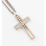 A Chopard 'Happy Diamonds' cross pendant, with seven free moving round brilliant cut diamonds and