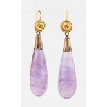 A pair of amethyst dropper earrings, with shepherd hook findings, suspending a tear drop amethyst