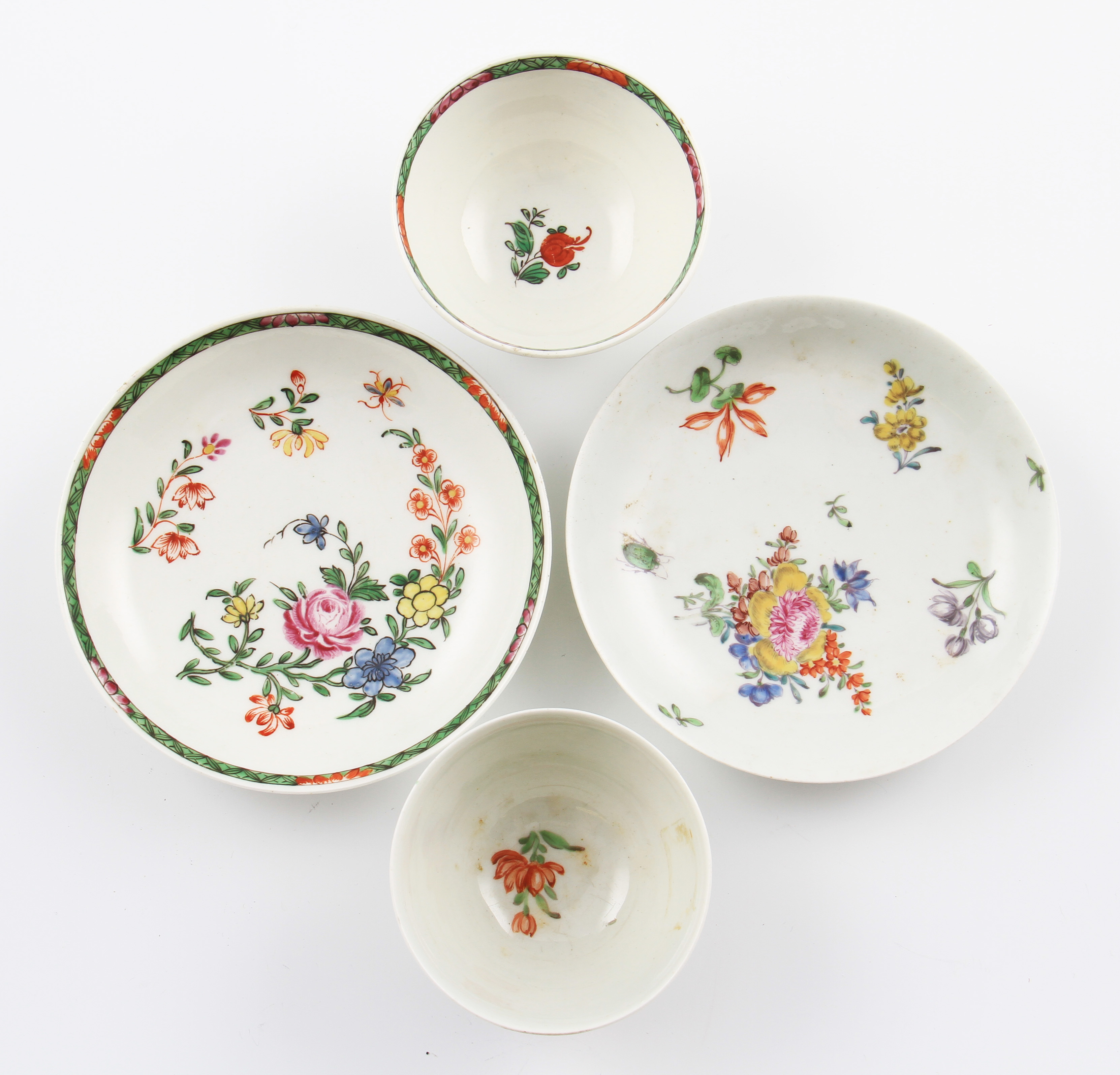 Two 18th Century Worcester porcelain tea bowls and saucers with floral decorations, both unmarked. - Image 2 of 3