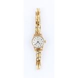 A 9ct yellow gold cased Richmond ladies wrist watch, the silvered dial having hourly Arabic