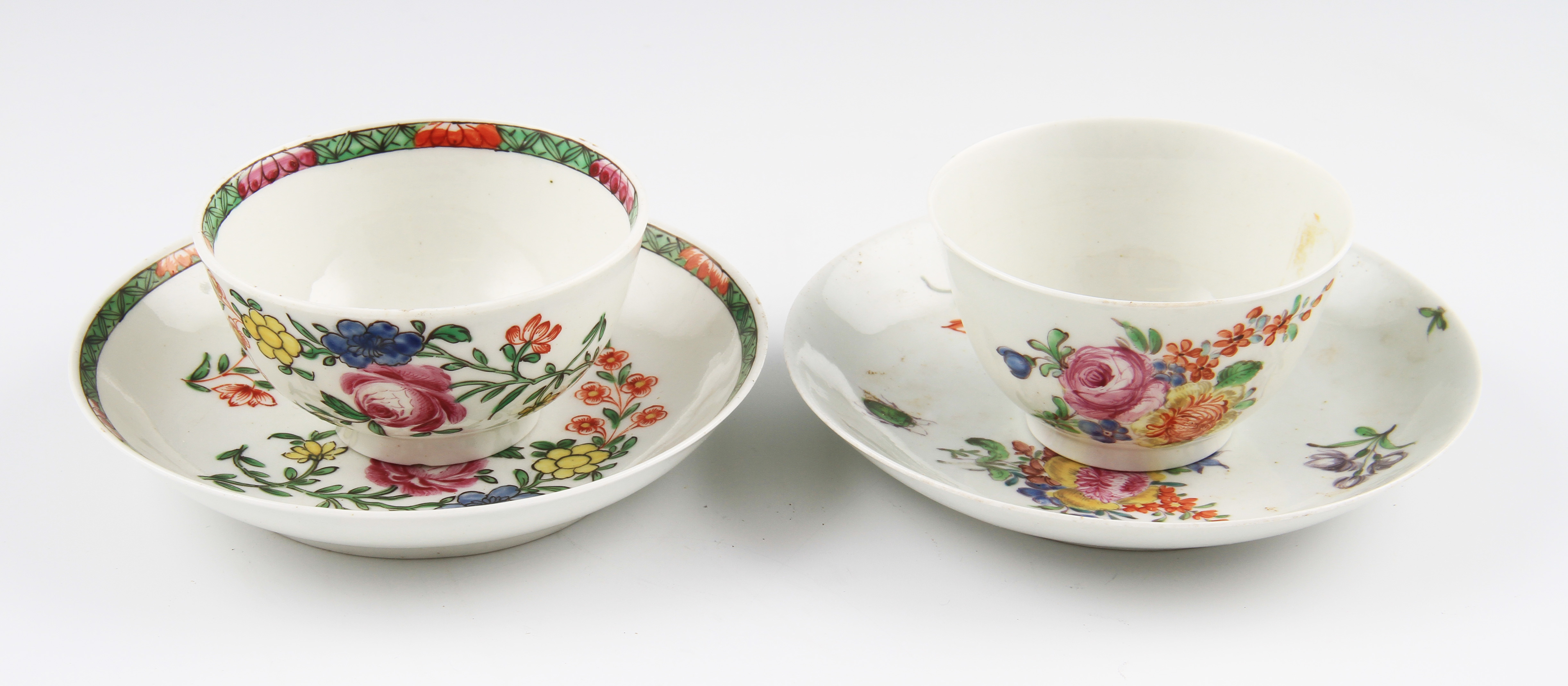 Two 18th Century Worcester porcelain tea bowls and saucers with floral decorations, both unmarked.