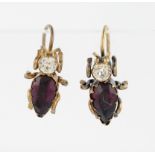 A pair of novelty gemstone set earrings in the shape of insects.