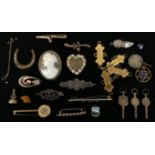 A collection of brooches, charms, seals and pocket watch keys, to include a Mizpah brooch, cameo