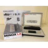 A Minox LX camera with original box and booklet.