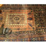 An Iranian runner rug with unique design, on blue ground, length 285cm, width 116cm.