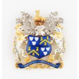 An 18ct yellow gold enamel and diamond set brooch depicting the crest for The Worshipful Company