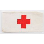 A Red Cross arm band with indistinct stamp to rear.