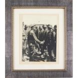 A German black and white mounted on paperboard photograph of Heinrich Himmler and officers reviewing