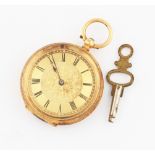 A yellow metal key wind open face fob watch, the gold tone dial having hourly Roman numeral