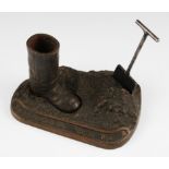 A German RAD (N.S. Arbeitsdienst) bronze remembrance desk ornament with boot and spade, reads to