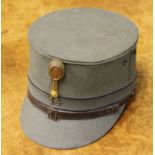 A Dutch military kepie hat, wrote to inside 14e Infantry Regiment, made by A. W. Evers.
