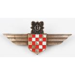 A German Croatia pilots badge with red and white enamelled chequerboard shield design with wings