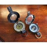 Two military compasses; WW1 compass by S Mordan & Co dated 1917 numbered 62642, and a WW2 compass by