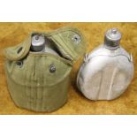 Two WW2 water bottles, one having US canvas cover dated 1945.