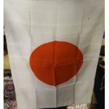 A Japanese Hinomaru silk flag with reinforced corners, 93cm by 68cm.