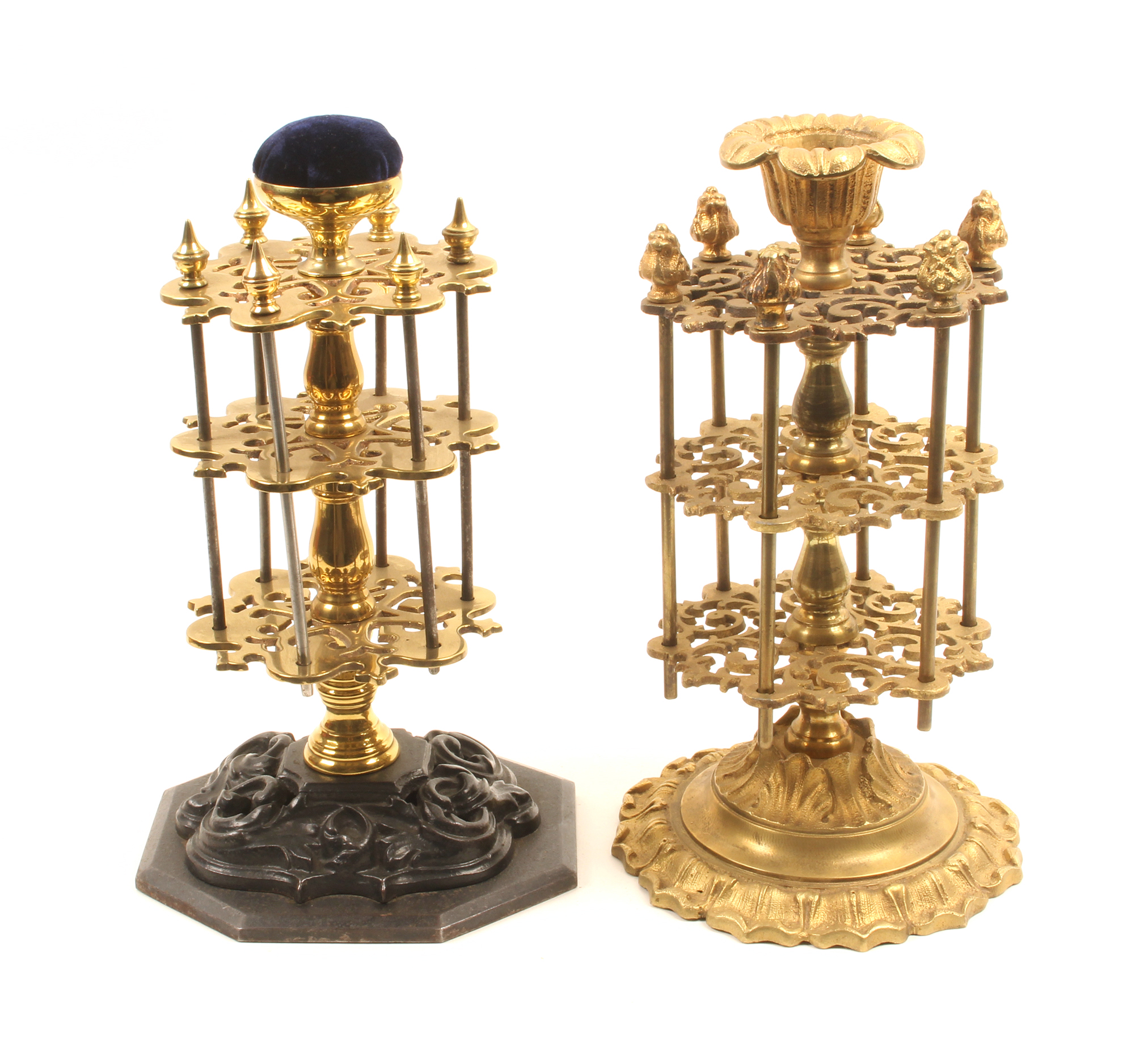 Two 19th Century reel stands comprising a brass example with three pierced circular tiers and six