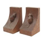 A pair of ‘Mouseman’ Thompson oak bookends each with swept mouse carved end, 15cm. (2)