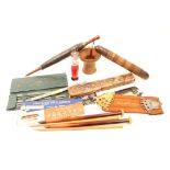 Sundry knitting needles in packets, and cases, an umbrella form needle case, carved Tyrolean