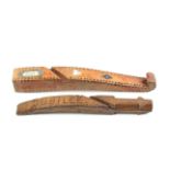 Two 19th Century dated wooden knitting sticks, Northumberland/Durham, comprising a curved scroll and