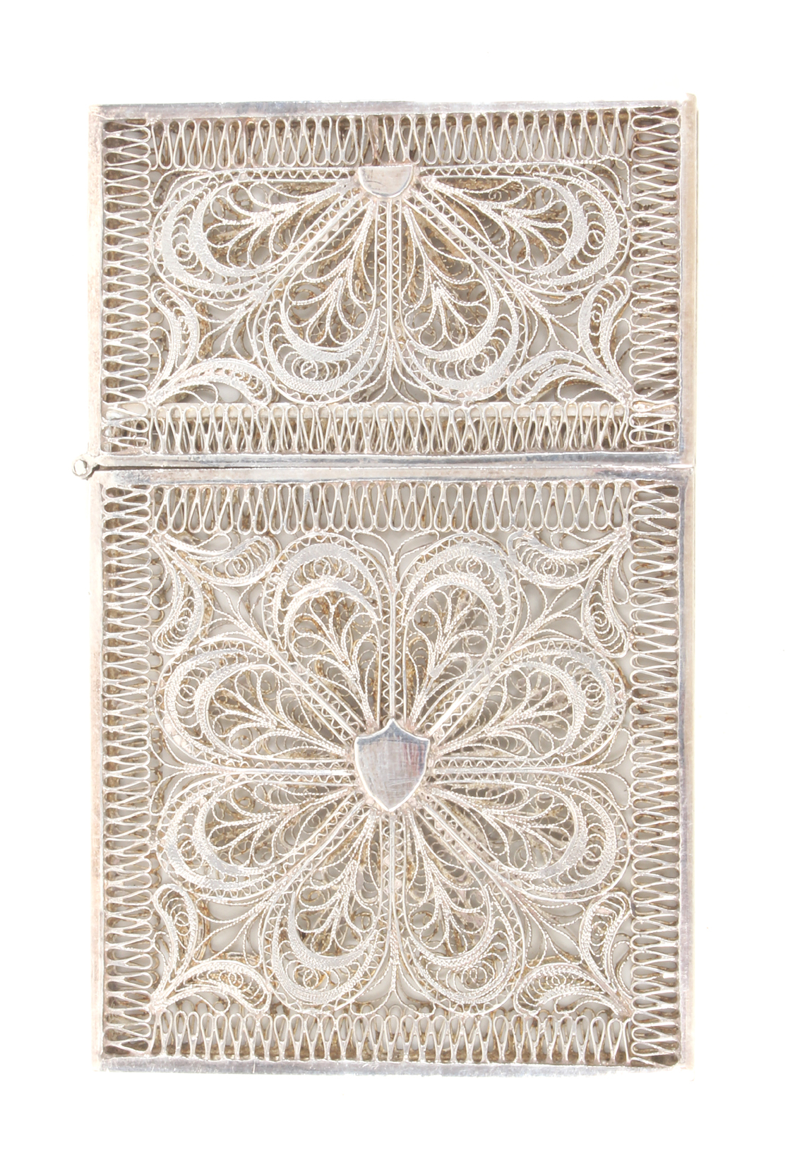 A 19th Century silver filigree visiting card case central shield motif to one side within panels