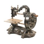 A Victorian sewing machine with lion mask and scroll top mount, stamped ‘Newton, Wilson and Co,